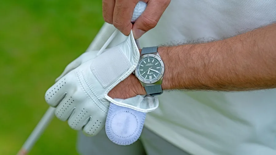 The %product_count% Best Golf Shoes 2 Golfer assessing shoe fit and comfort during club preparation before round
