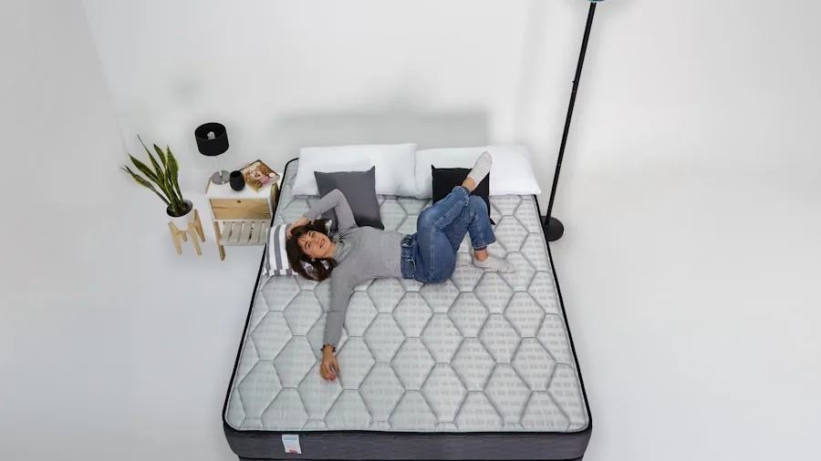 The 11 Best Sleeper Sofas 3 Guest testing mattress comfort and support on a bed in a bedroom setting