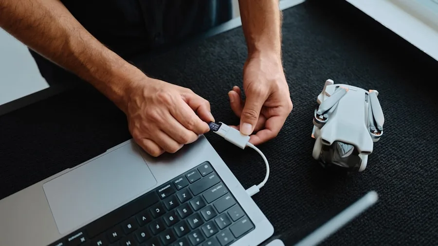 MacBook Air M5 Upgrades What You Should Know About the Latest Changes 3 hands charging laptop cable