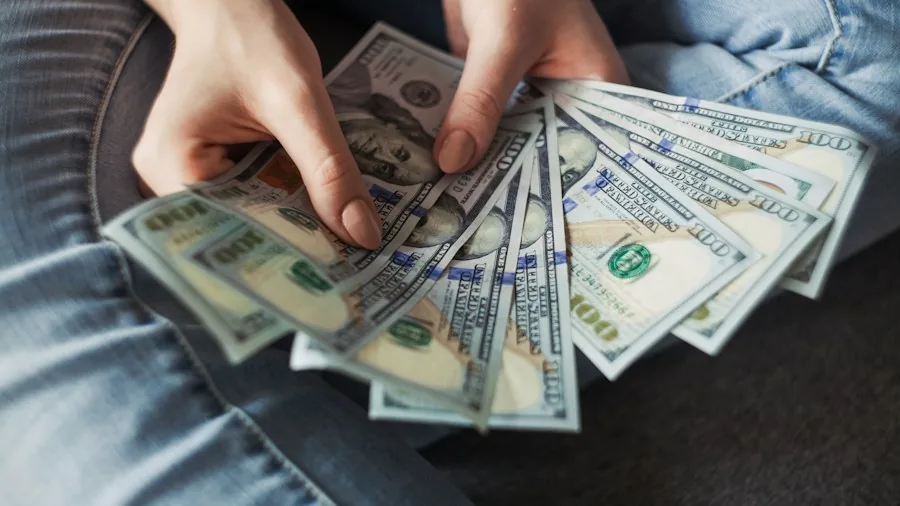 hands counting cash tips
