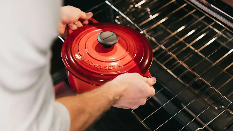 hands holding oven safe cookware