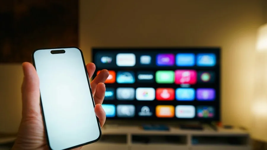 Fire TV Sideloading Bug Explained: What Happened and What Shoppers Need to Know 3 hands holding remote home theater