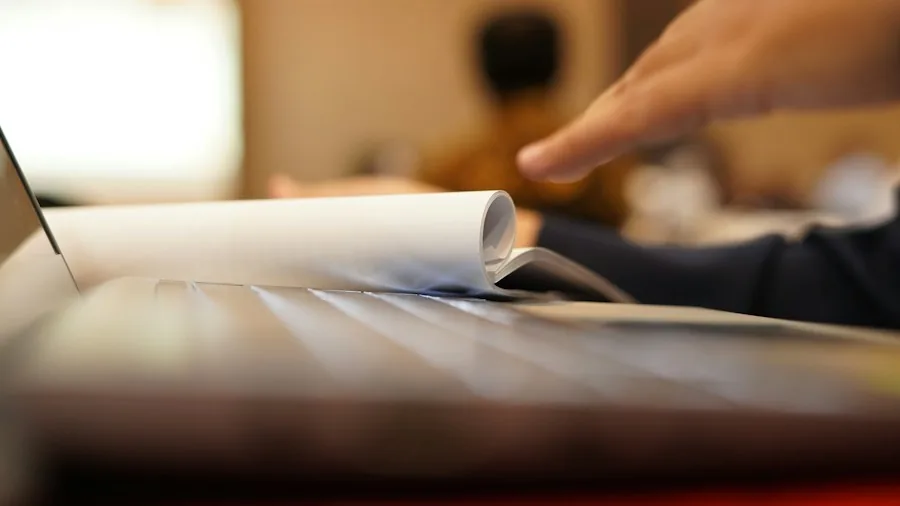 Touchscreen Laptops Are Worth Your Money: Here's Why Buyers Are Switching 2 hands scrolling through document on screen