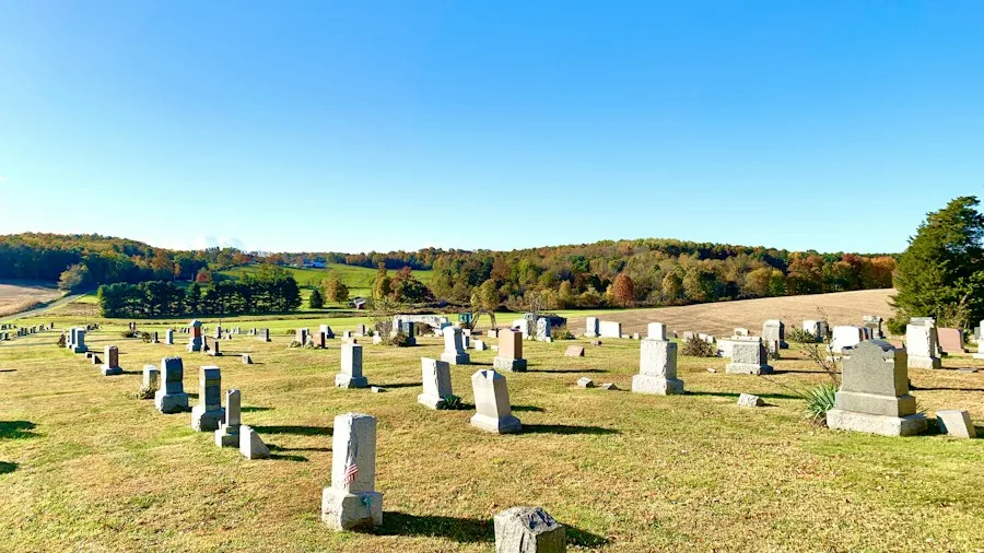 Cemetery Hiking Trend Takes Off: What Shoppers Need to Know About This Growing Outdoor Movement 3 hiker exploring historic cemetery