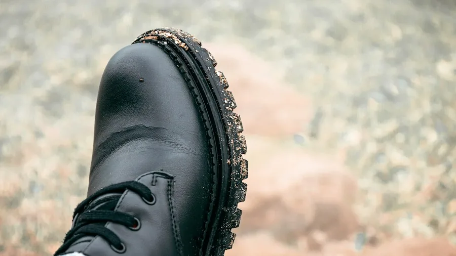 New Study Reveals Heavy Hiking Packs Damage Your Feet: What You Need to Know Before Your Next Trek 2 hiking boots close-up on rocky terrain