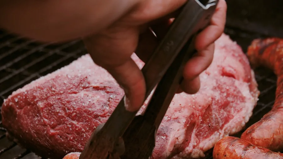 Home cook examining thermometer battery during meal preparation in kitchen