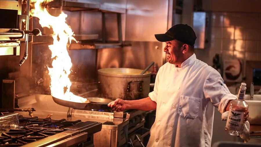 The %product_count% Best Ranges 3 Home cook stirring food in pan over gas flame on kitchen range