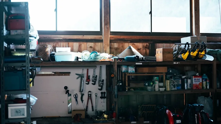Homeowner arranging metal shelving units and storage containers in a residential garage space