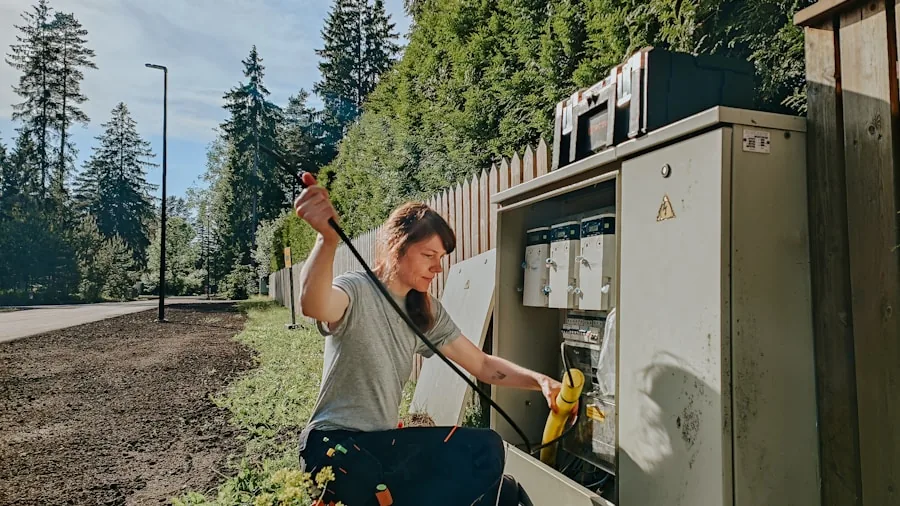 Homeowner using remote control to start backup generator during nighttime electrical outage