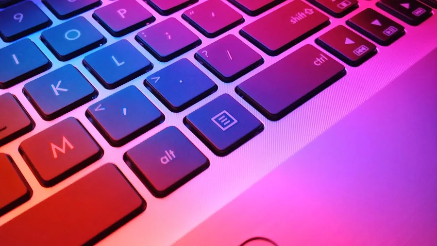 MSI's New Gaming Laptops Compared: Crosshair 16 HX E14W vs Cyborg 15 3 laptop keyboard gaming session