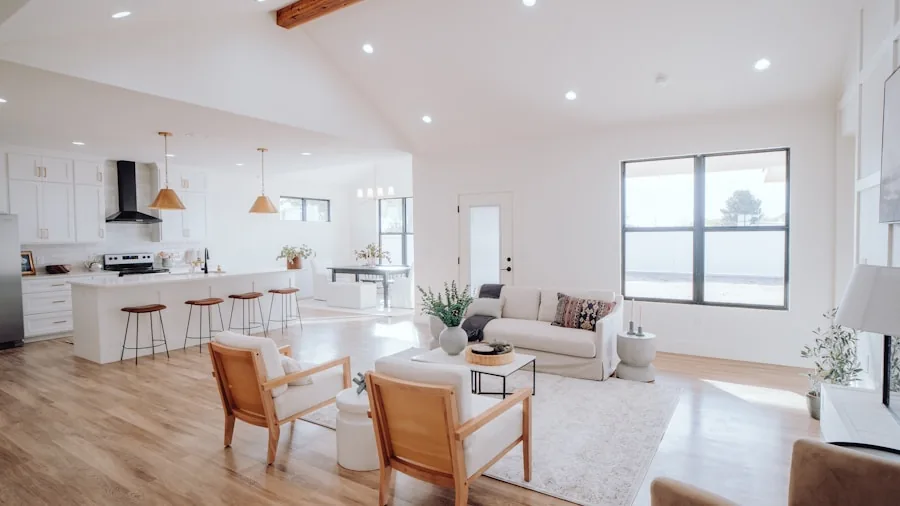 The 16 Best Robot Vacuums 5 Bright minimalist living room with clean hardwood floors and simple furniture in natural light