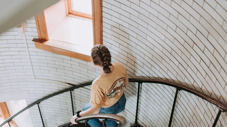 The 15 Best Vacuum Cleaners 3 Woman effortlessly vacuuming stairs with lightweight vacuum cleaner in home
