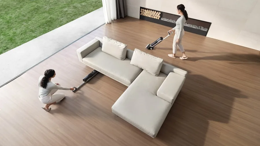 The 15 Best Vacuum Cleaners 4 Woman using corded vacuum cleaner on hardwood floor in spacious home interior
