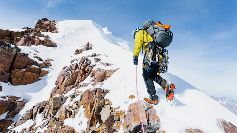 The %product_count% Best Hiking Pants for Men 2 Male hiker scrambling up steep rocky mountain slope with focus on leg movement and terrain navigation