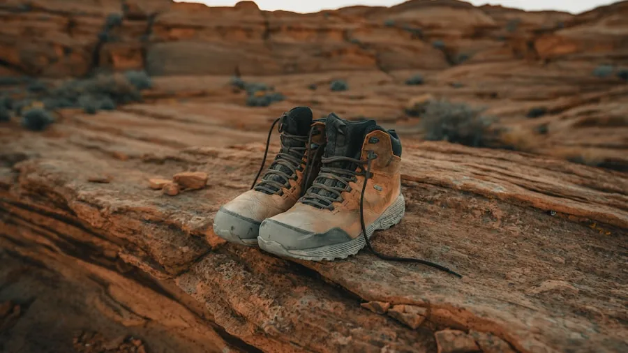 The %product_count% Best Hunting Boots for Men 3 Male hiker walking through uneven woodland terrain wearing sturdy hiking boots and backpack