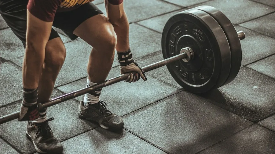 man doing controlled weightlifting