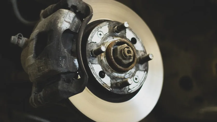 The %product_count% Best Brake Pads 4 Mechanic examining brake rotor condition during vehicle maintenance inspection