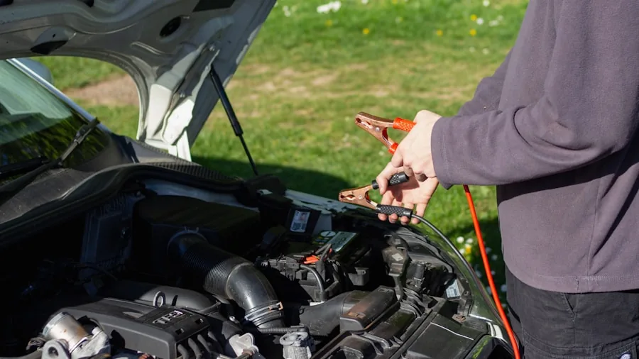 The %product_count% Best Car Batteries 2 Mechanic examining car battery specifications and measurements in engine bay