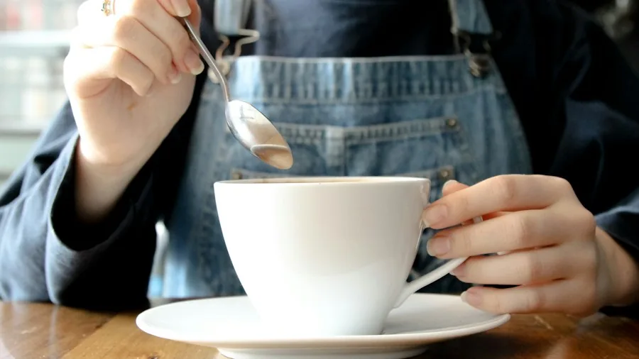 Major French Press Recall Affects Millions of Coffee Makers What Shoppers Need to Know 2 metal spoon stirring coffee