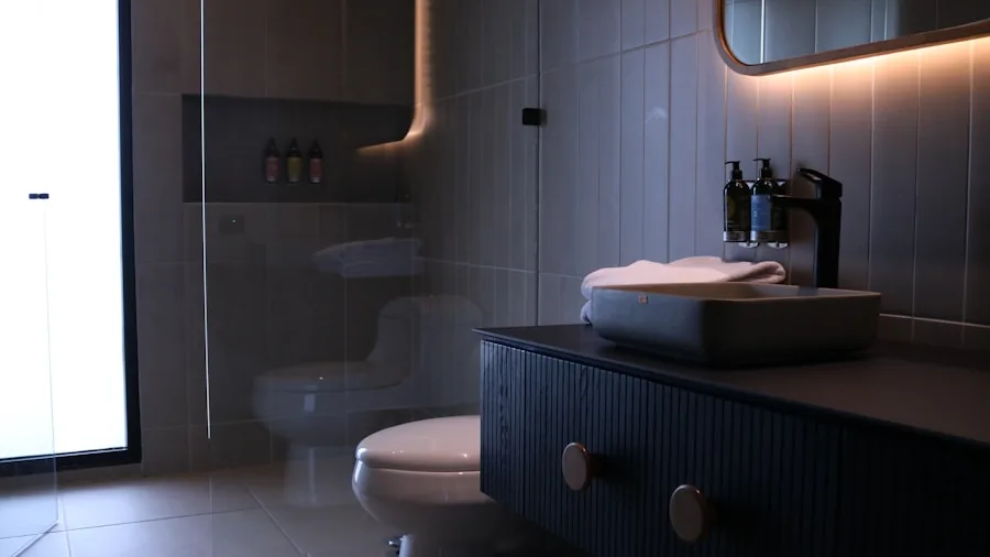 Minimalist bathroom with neutral tones and textured wall details creating a spa-like atmosphere
