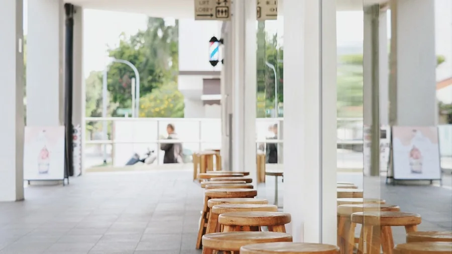 Coffee Shop Design Trends: How Architecture Shapes the Cafe Experience 2 minimalist cafe seating area