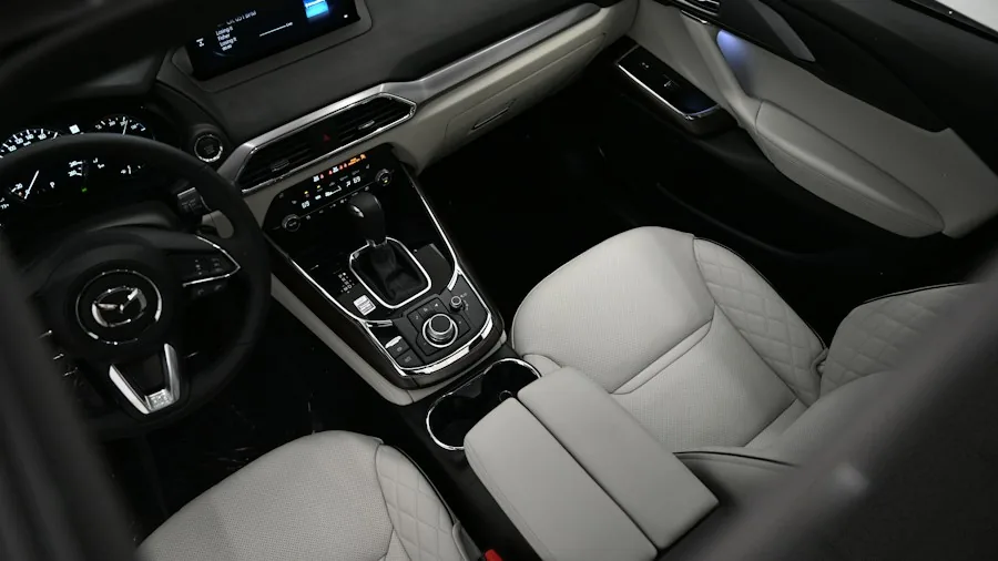 Chevy Traverse and GMC Acadia Get Hybrid Powertrains: What SUV Buyers Need to Know 3 modern SUV interior seating