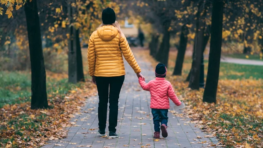 mother in leggings walking outdoors