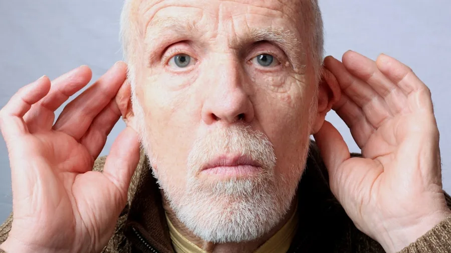 Older adult discussing hearing health options with healthcare professional in clinical setting
