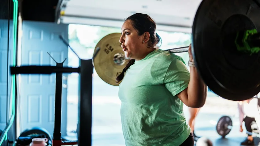 70 Year Old Fitness Coach Reveals 5 Habits That Keep You Strong and Independent 2 older adult lifting weights