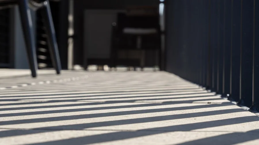 Target Just Dropped Laser-Cut Privacy Screens: What Backyard Shoppers Should Know 2 outdoor patio shade dappled sunlight