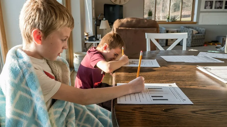 parent helping child focus on homework