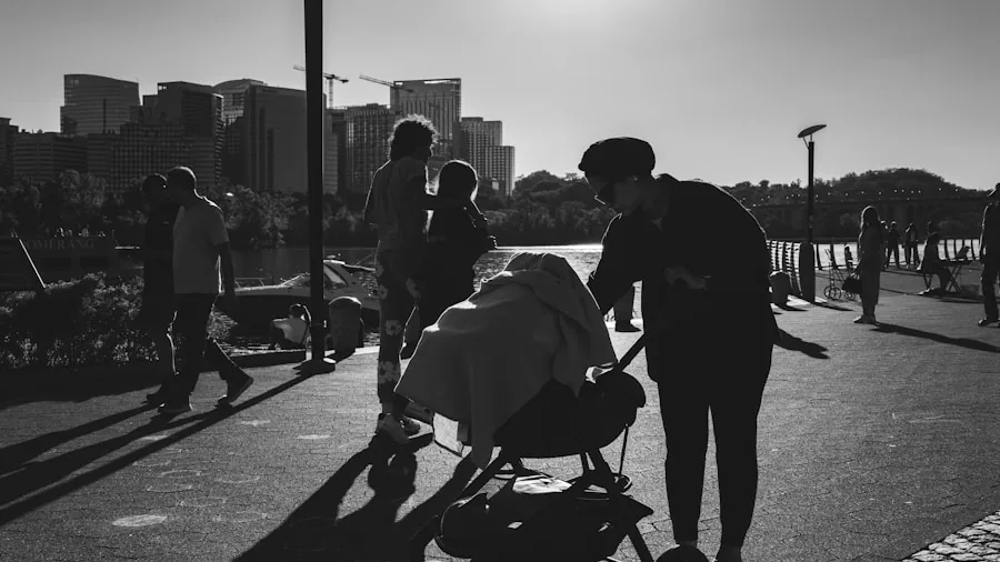 Parent navigating stroller on urban sidewalk with child during outdoor walk