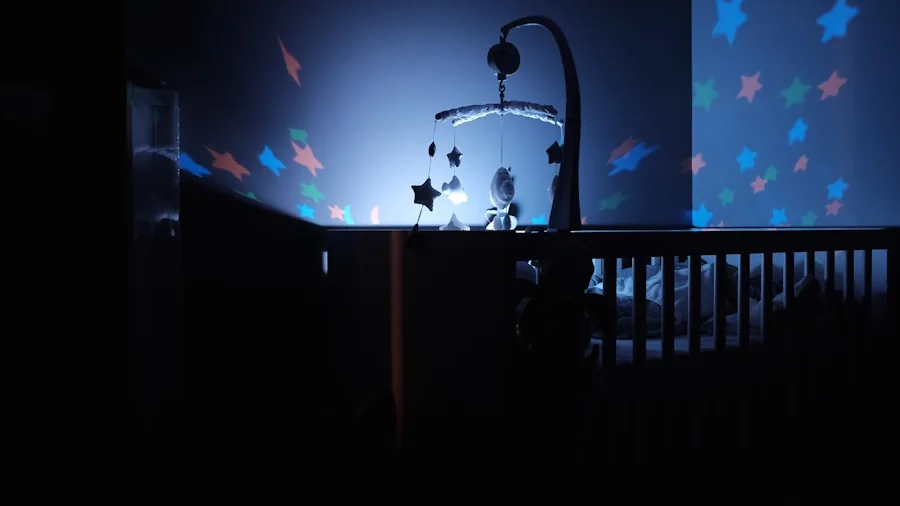 The %product_count% Best Baby Monitors 6 Parent viewing baby monitor display in dimly lit nursery at night