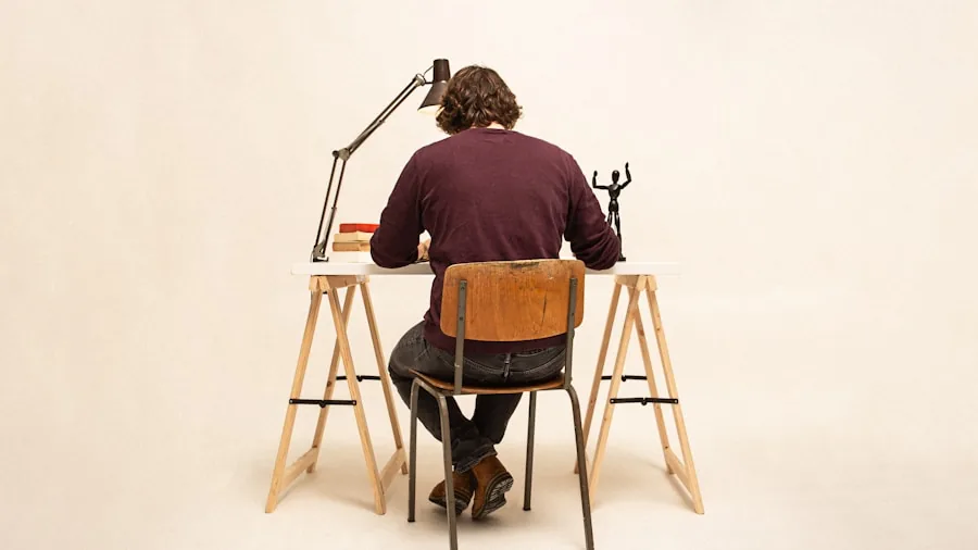 The %product_count% Best Light Therapy Lamps 6 Person adjusting a desk lamp to eye level for proper ergonomic positioning while working at home