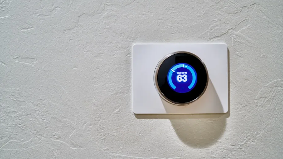 Person adjusting digital climate control settings on modern smart home device in comfortable living room