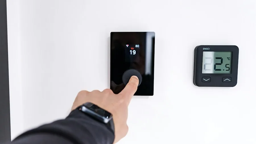 Amazon Speaker and Echo Device Announcements: What Buyers Should Know 3 person adjusting smart home device