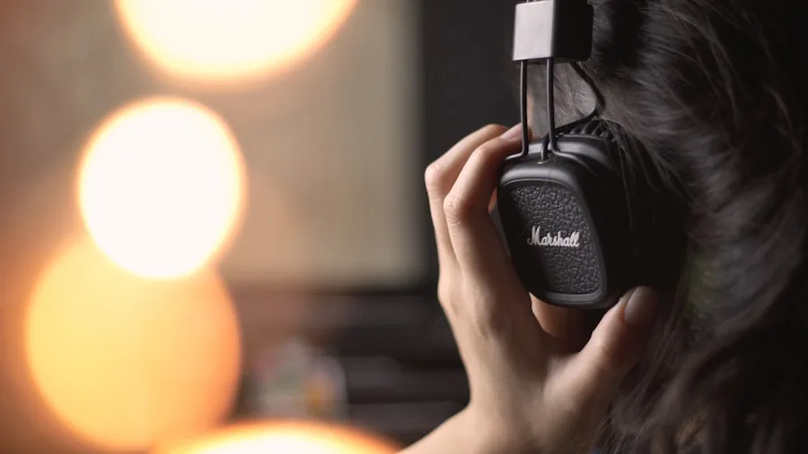 Swimming Headphones Explained: Why They Work Differently Than Regular Headphones 2 person adjusting wireless headphones