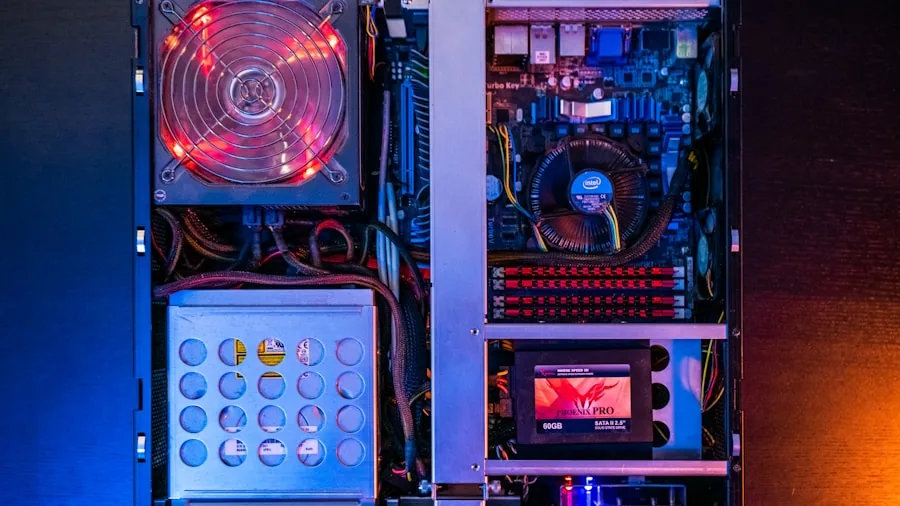 The %product_count% Best Motherboards 5 Person assembling PC motherboard inside computer case during build process