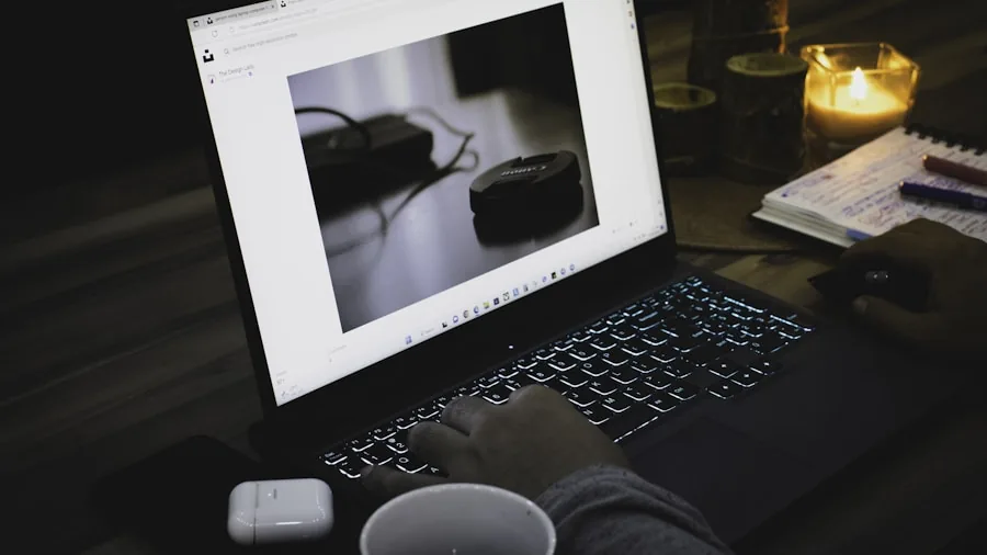 The %product_count% Best GPUs for Gaming 6 Person at desk researching gaming hardware on laptop with notebook, planning technology purchase decision