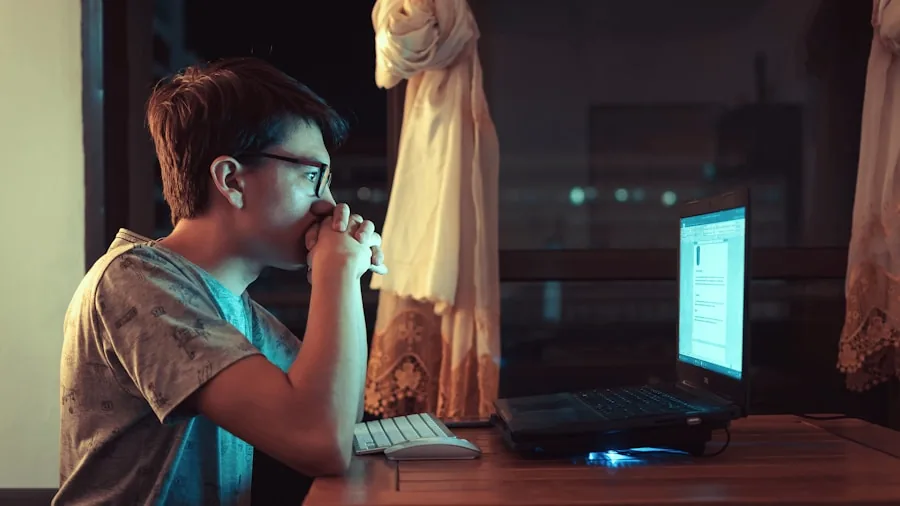 The %product_count% Best DDR5 RAM 5 Person carefully adjusting computer settings at desk with concentration and precision