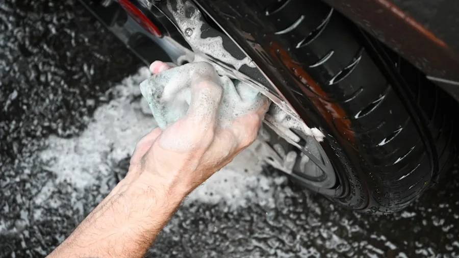 The %product_count% Best Tire Cleaners 2 Person carefully cleaning and detailing a car wheel with protective care