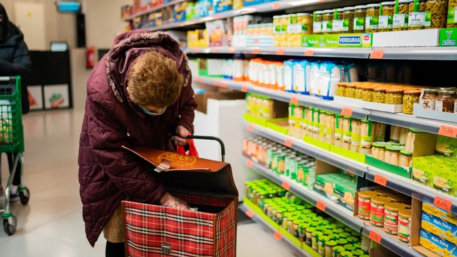 The %product_count% Best Coffee Creamers 3 Person carefully examining food label ingredients while shopping in grocery store