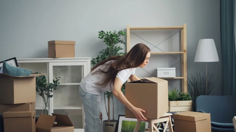 The 12 Best Portable Air Conditioners 6 Person carrying heavy portable air conditioning unit with handles across room