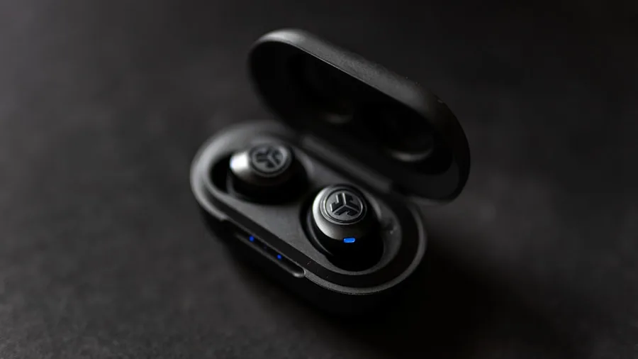 The %product_count% Best Open Ear Earbuds 3 Person charging wireless earbuds during active lifestyle break, focus on battery and convenience
