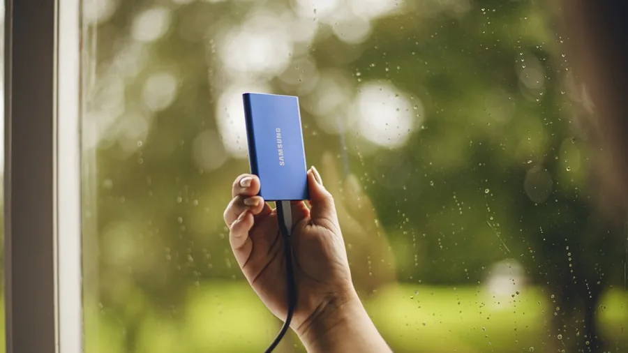 Person checking phone battery health and charge cycles during daily use