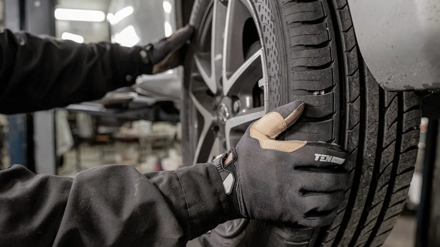 The %product_count% Best Tire Pressure Gauges 2 Person checking tire pressure gauge on vehicle wheel during routine car maintenance