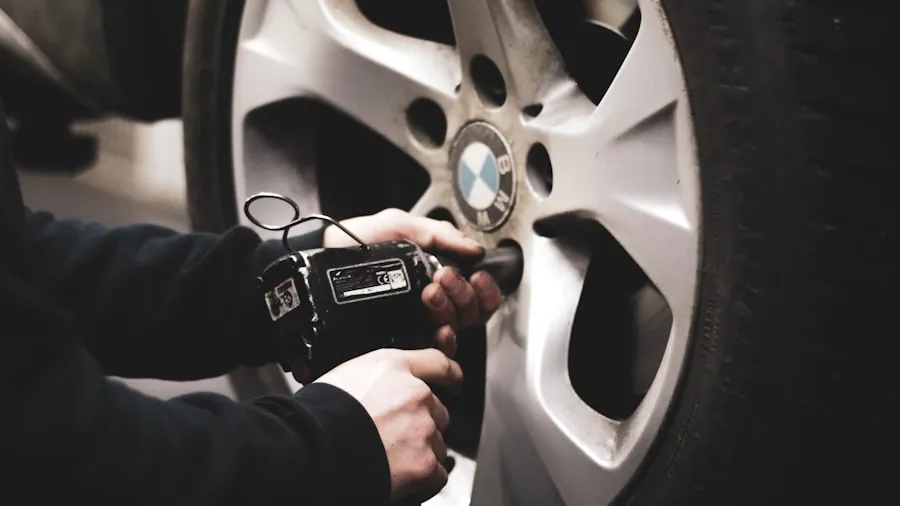 The %product_count% Best Tire Pressure Gauges 5 Person checking vehicle tire pressure with gauge during routine car maintenance and safety inspection