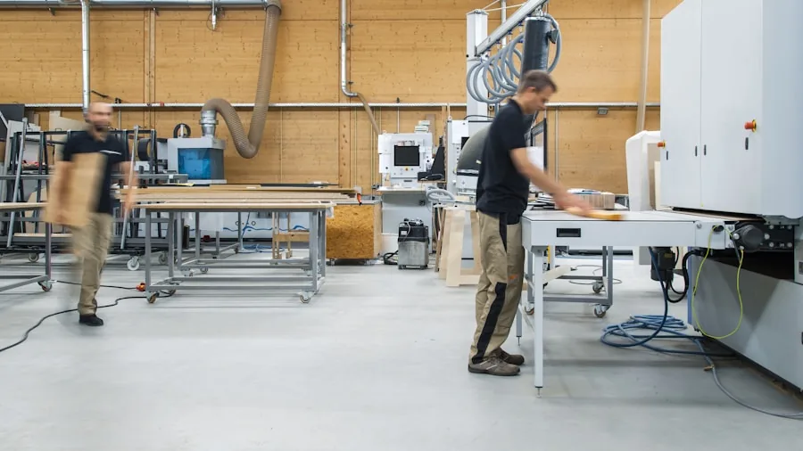 Person cleaning and maintaining shop vacuum filter in workshop environment