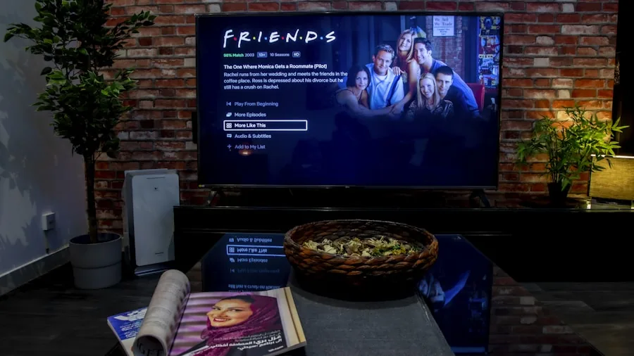 The %product_count% Best Antennas for TVs 3 Person connecting cable to back of TV in modern living room for antenna setup