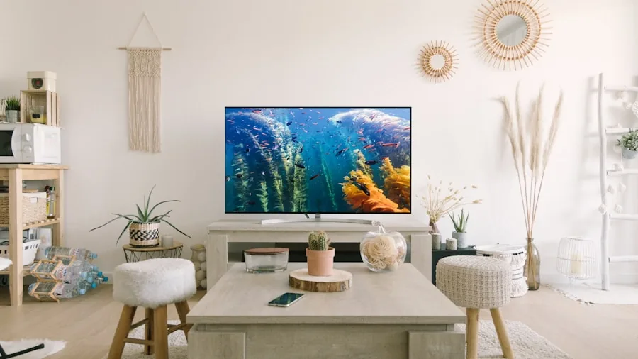 The %product_count% Best 50 Inch TVs 4 Person connecting HDMI cables to wall-mounted television in modern living room